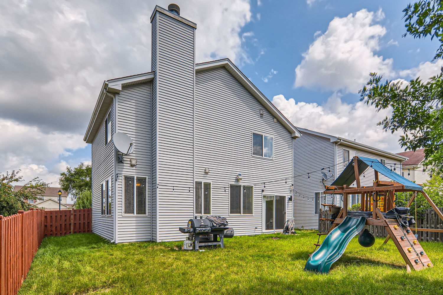 487 West Hamlin Lane Round Lake, IL 60073 - Photo 7 of 28 a view of a house with backyard