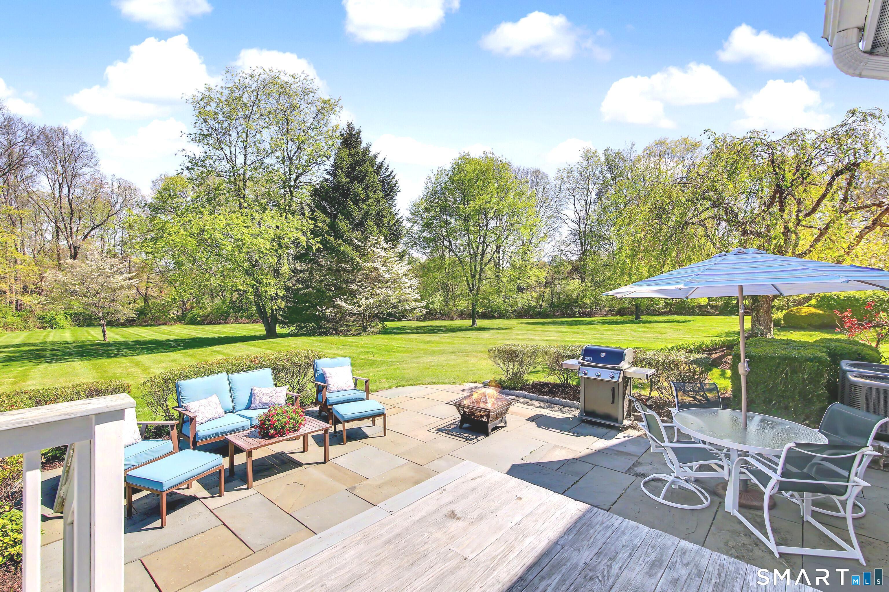 7 Jeremiah Sanford Road Redding, CT 06896 - Photo 15 of 40 28' X 15' Deck steps down to a 27' X 21' Patio and endless yard