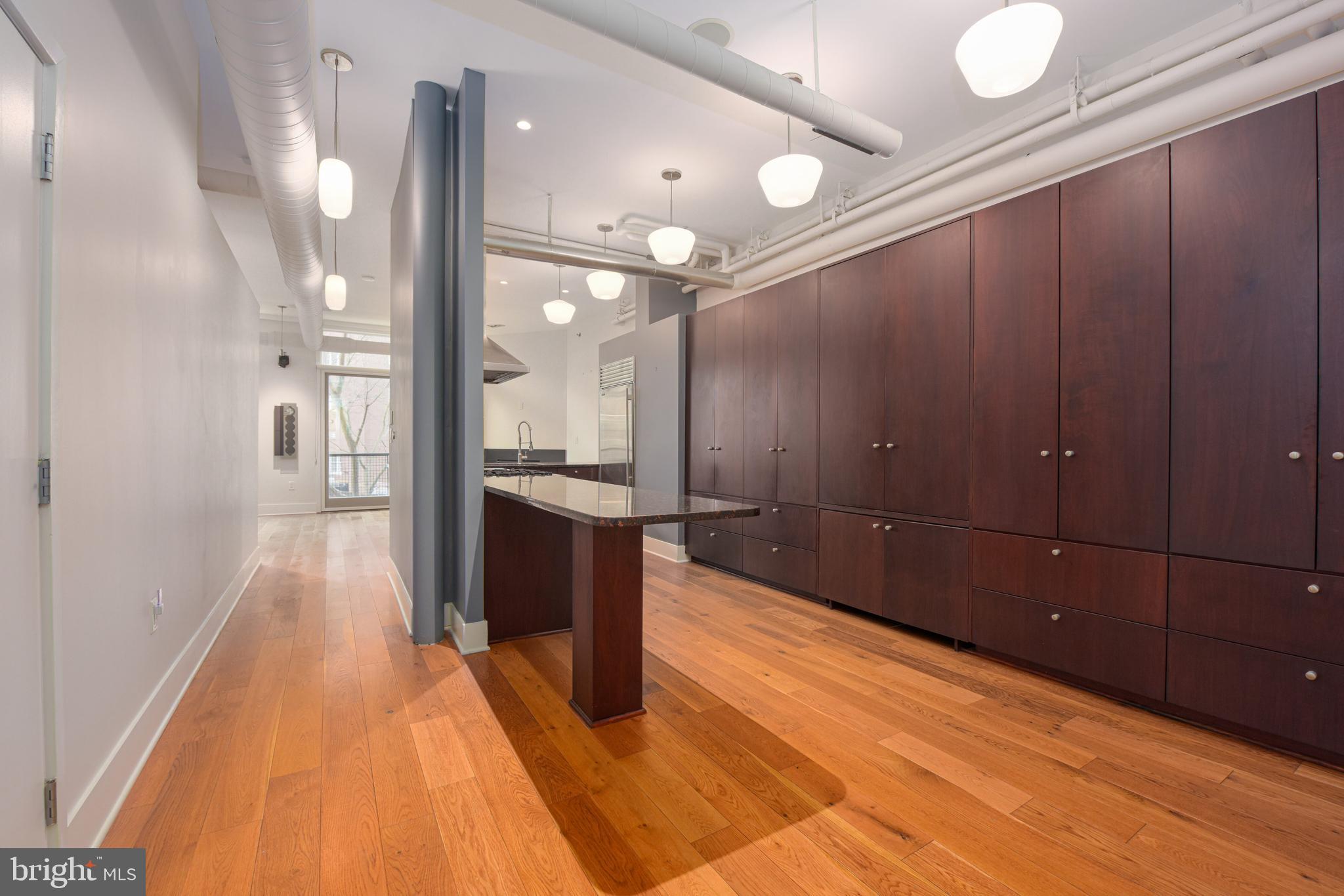 1700 Kalorama Road Northwest, Unit 307 Washington, DC 20009 - Photo 5 of 34 Kitchen with wall of storage