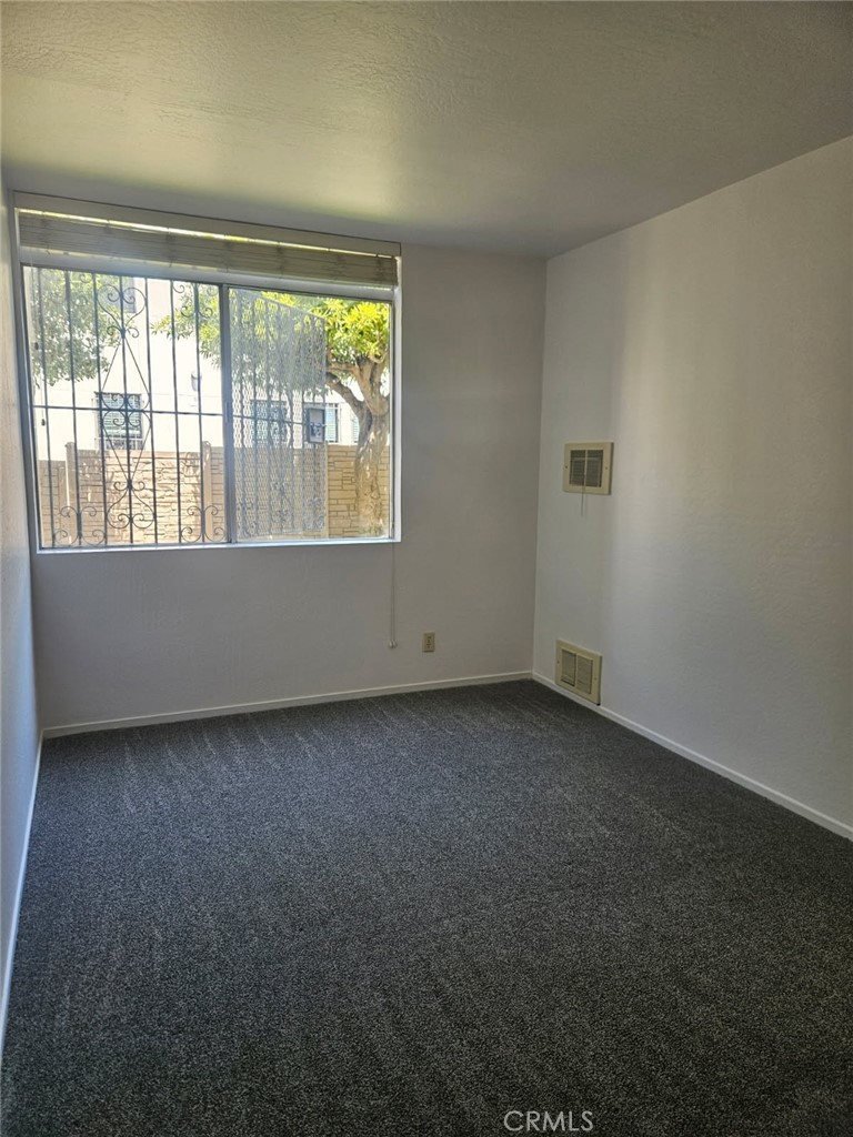 75 Western Shore Lane, Unit 1 San Francisco, CA 94115 - Photo 16 of 17 an empty room with a window