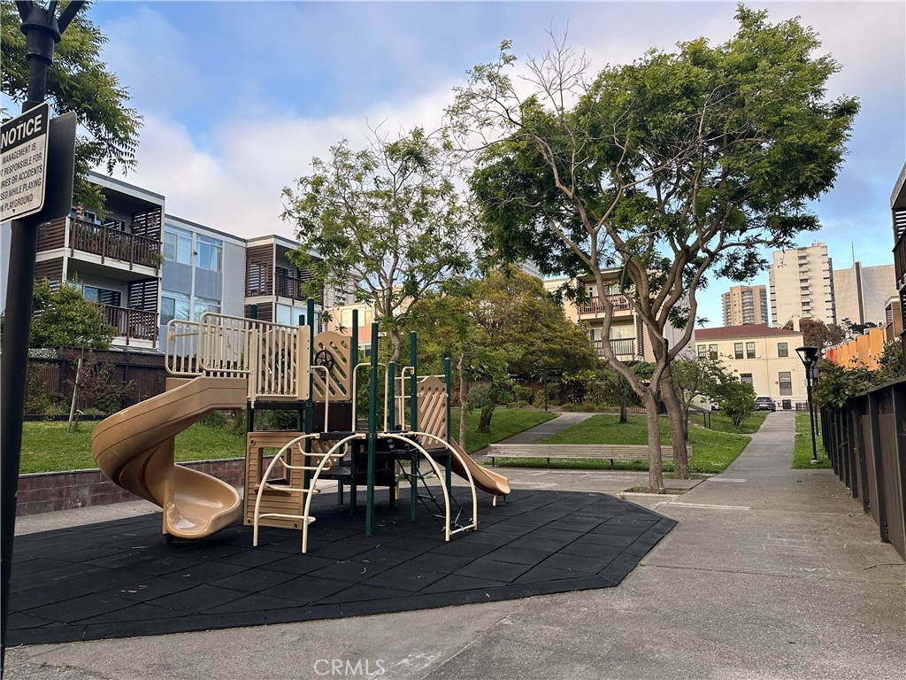 75 Western Shore Lane, Unit 1 San Francisco, CA 94115 - Photo 6 of 17 a view of outdoor space yard deck patio and fire pit