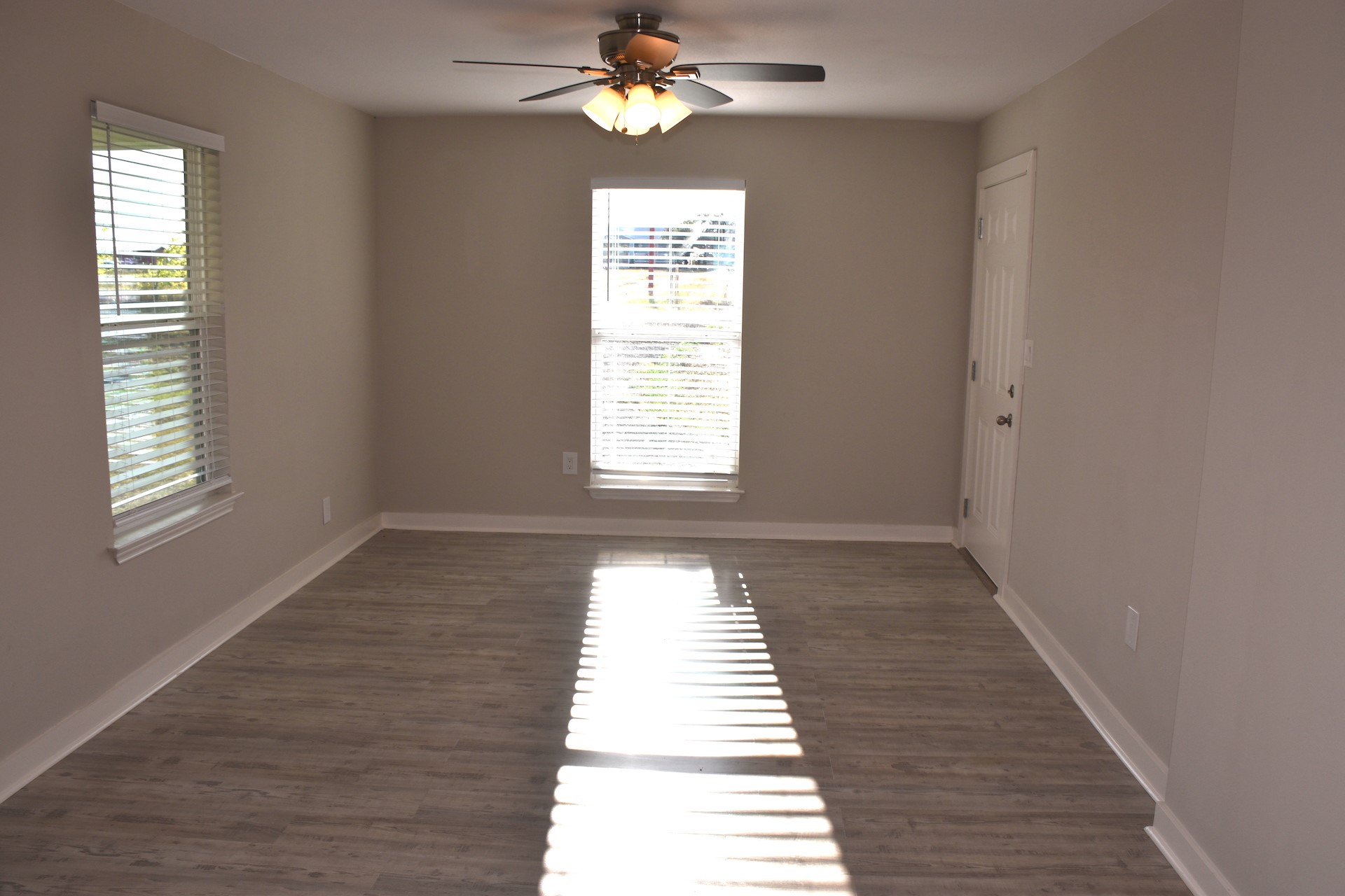 3751 County Road 463 Elgin, TX 78621 - Photo 10 of 27 a view of empty room with wooden floor and fan
