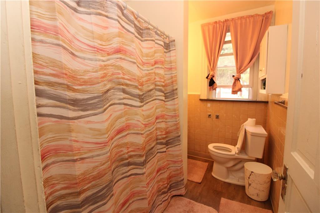 114 Greydon Avenue McKees Rocks, PA 15136 - Photo 10 of 12 a bathroom with a toilet and a sink