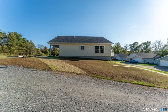 a view of balcony with wooden floor and fence
