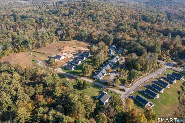 an aerial view of a house with a outdoor space