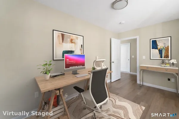 a kitchen with granite countertop a refrigerator a sink a stove a microwave and island