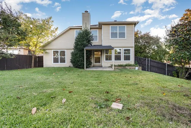 a house view with a garden space
