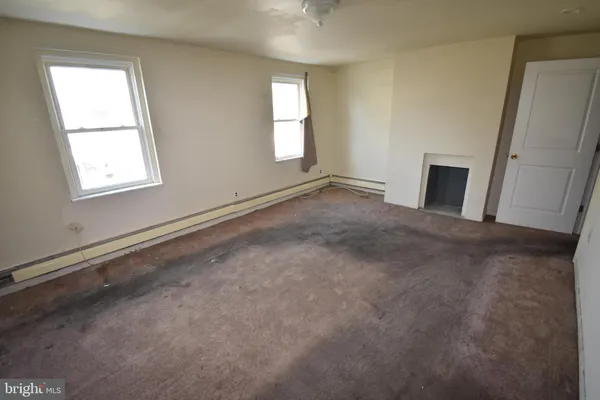a view of a room with staircase