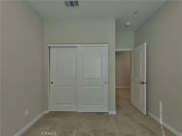 an empty room with closet