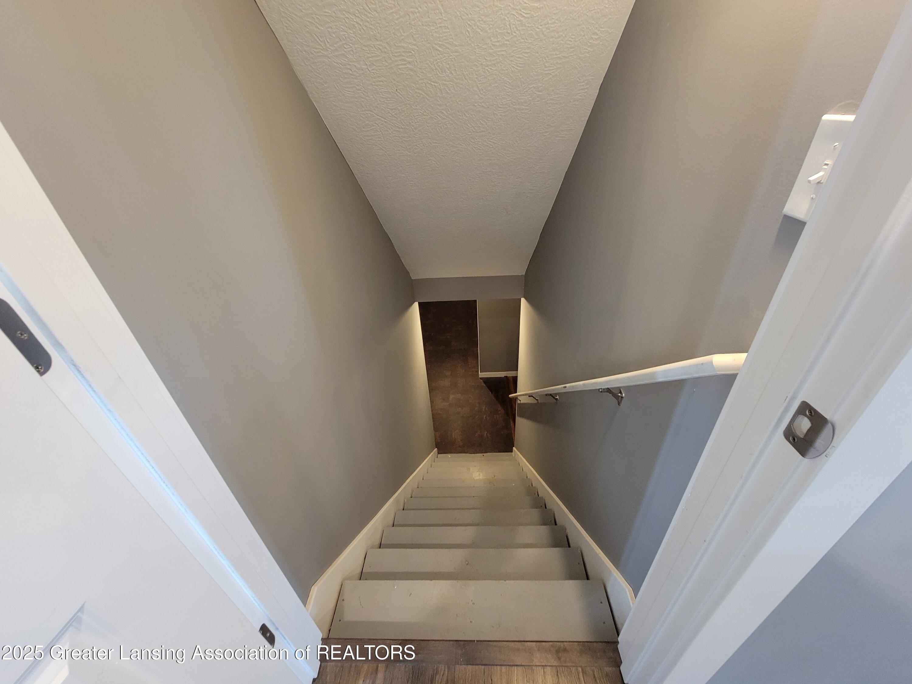 195 Jade Court Alma, MI 48801 - Photo 42 of 53 Basement stairs