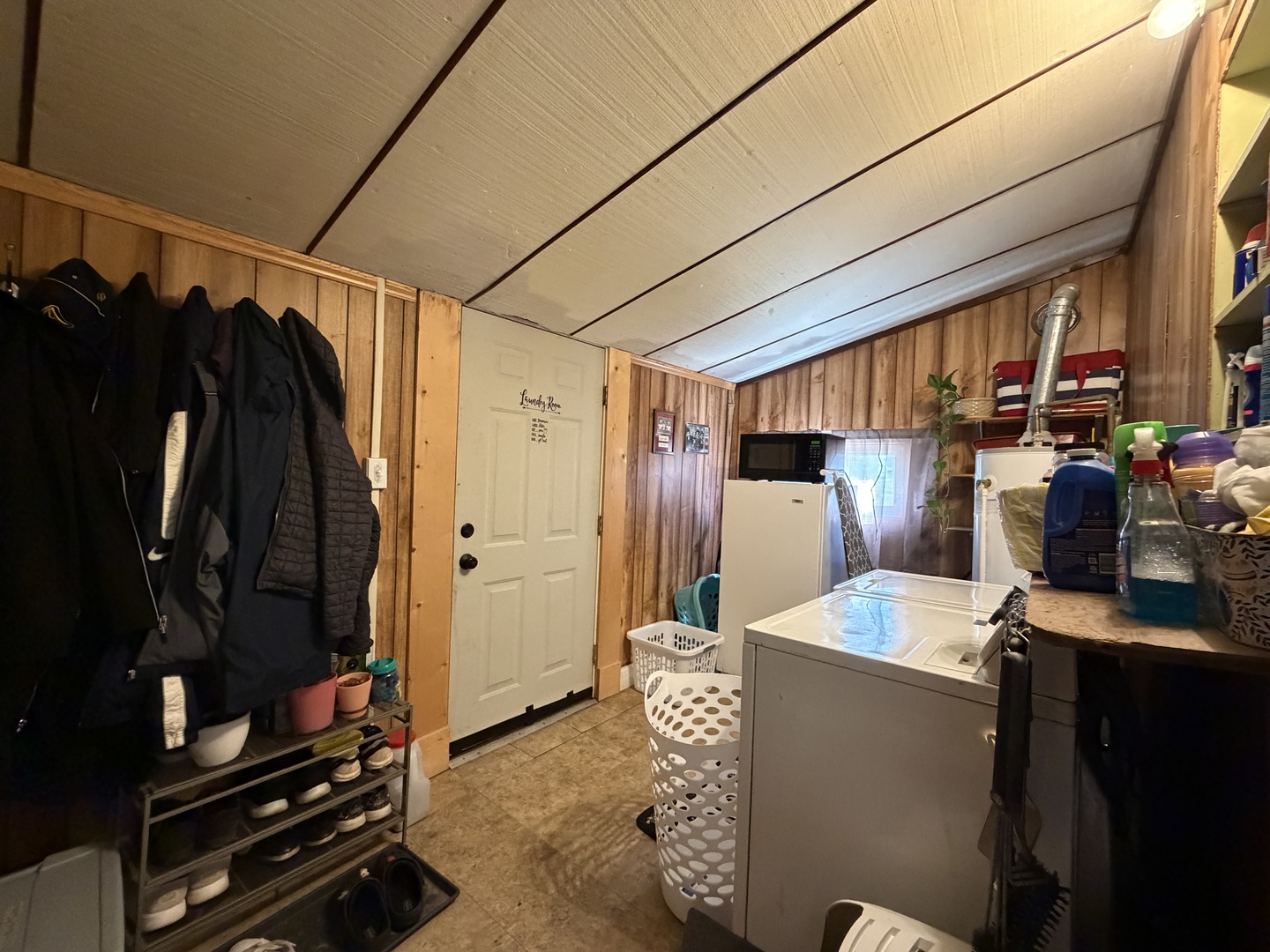 405 East Seminary Avenue Hoopeston, IL 60942 - Photo 21 of 38 a kitchen with stainless steel appliances kitchen island granite countertop a refrigerator and a stove top oven