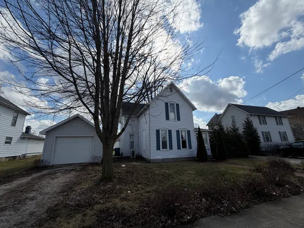 a view of house with outdoor space