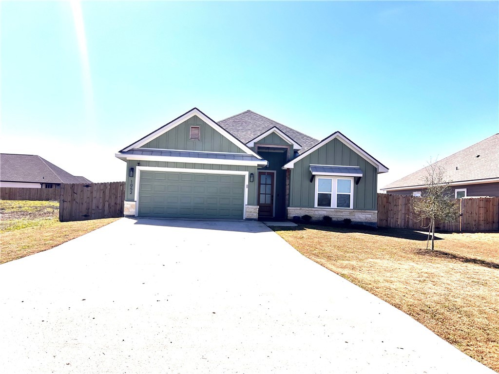 1052 County Road 268 Snook, TX 77879 - Photo 1 of 1 View of front of home featuring a 2 car garage, co