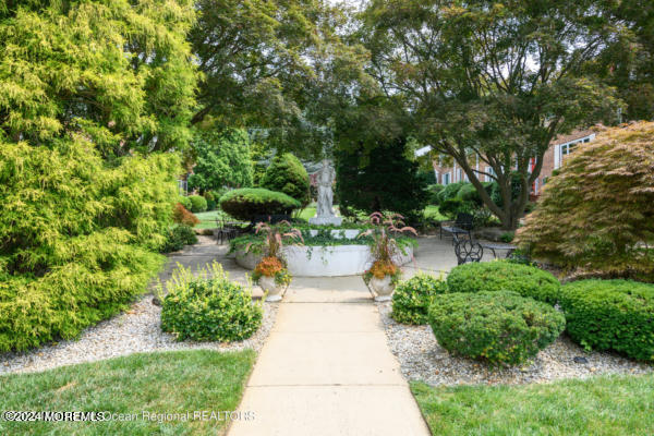 283 Spring Street, Unit 3D Red Bank, NJ 07701 - Photo 17 of 18 a view of a garden with plants