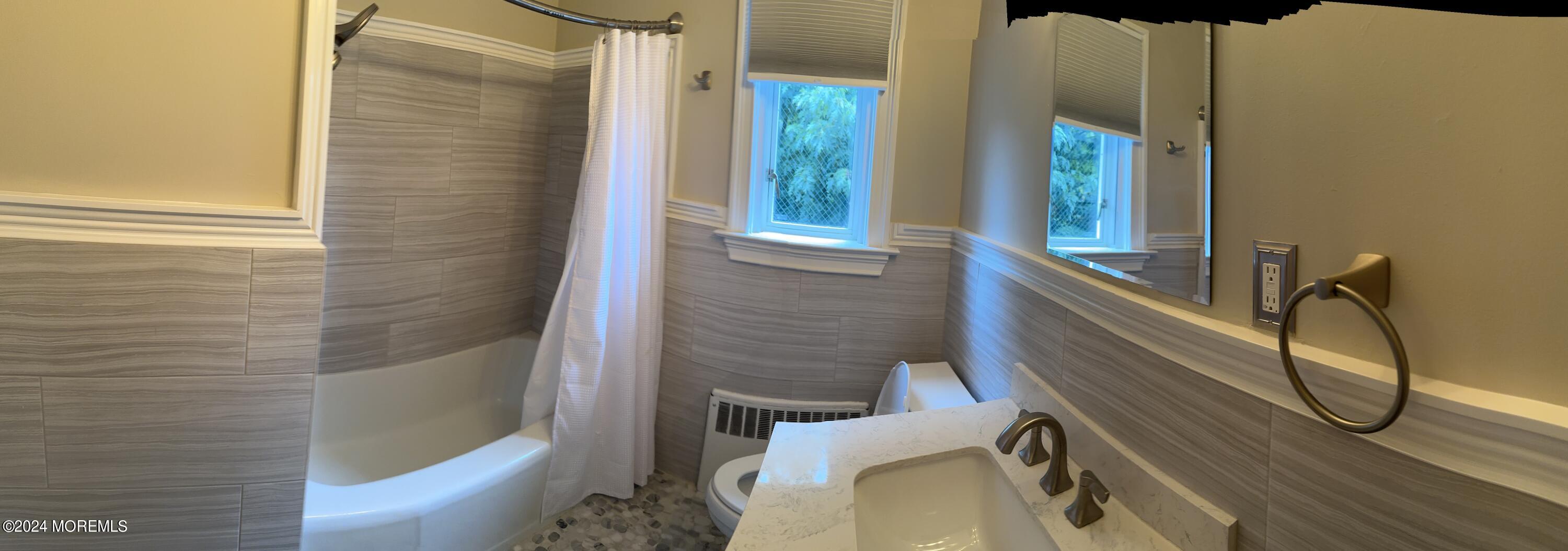 283 Spring Street, Unit 3D Red Bank, NJ 07701 - Photo 8 of 18 a bathroom with a granite countertop sink and a toilet