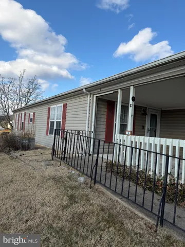 a view of a house with a porch