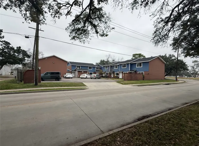 a city view with houses on the road