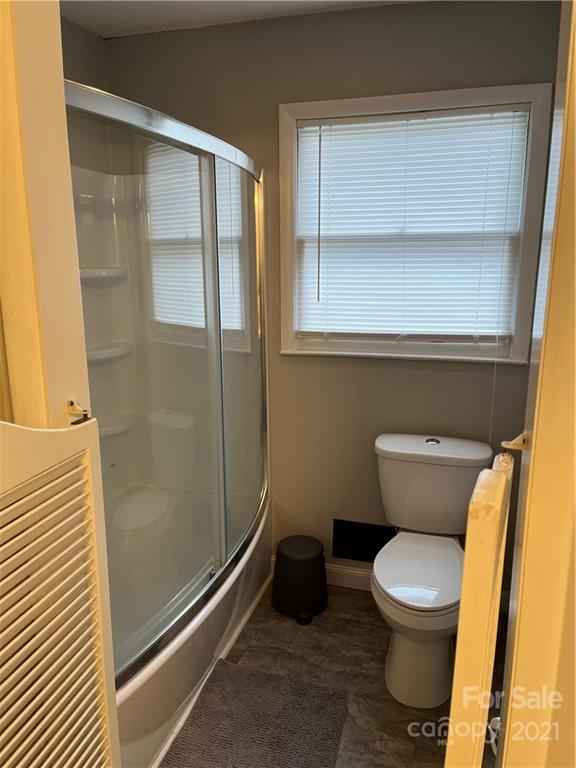 2419 Winfield Street Kannapolis, NC 28083 - Photo 16 of 25 a bathroom with a toilet and a shower