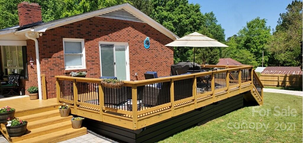 2419 Winfield Street Kannapolis, NC 28083 - Photo 3 of 25 a view of a house with pool and chairs