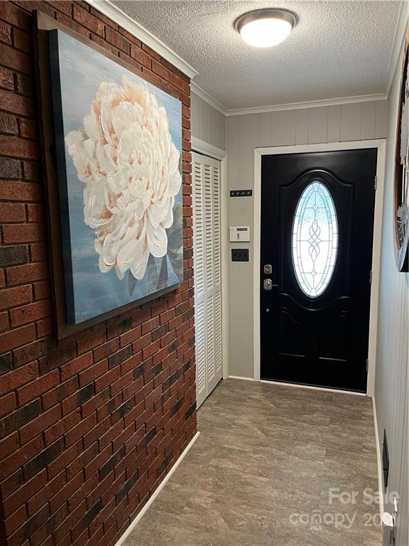 2419 Winfield Street Kannapolis, NC 28083 - Photo 7 of 25 a view of a hallway with wooden door