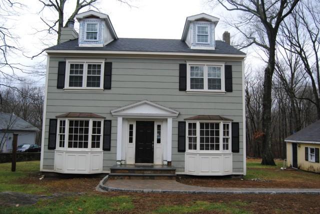 247 Moose Hill Road Monroe, CT 06468 - Photo 1 of 1 a front view of a house with a yard