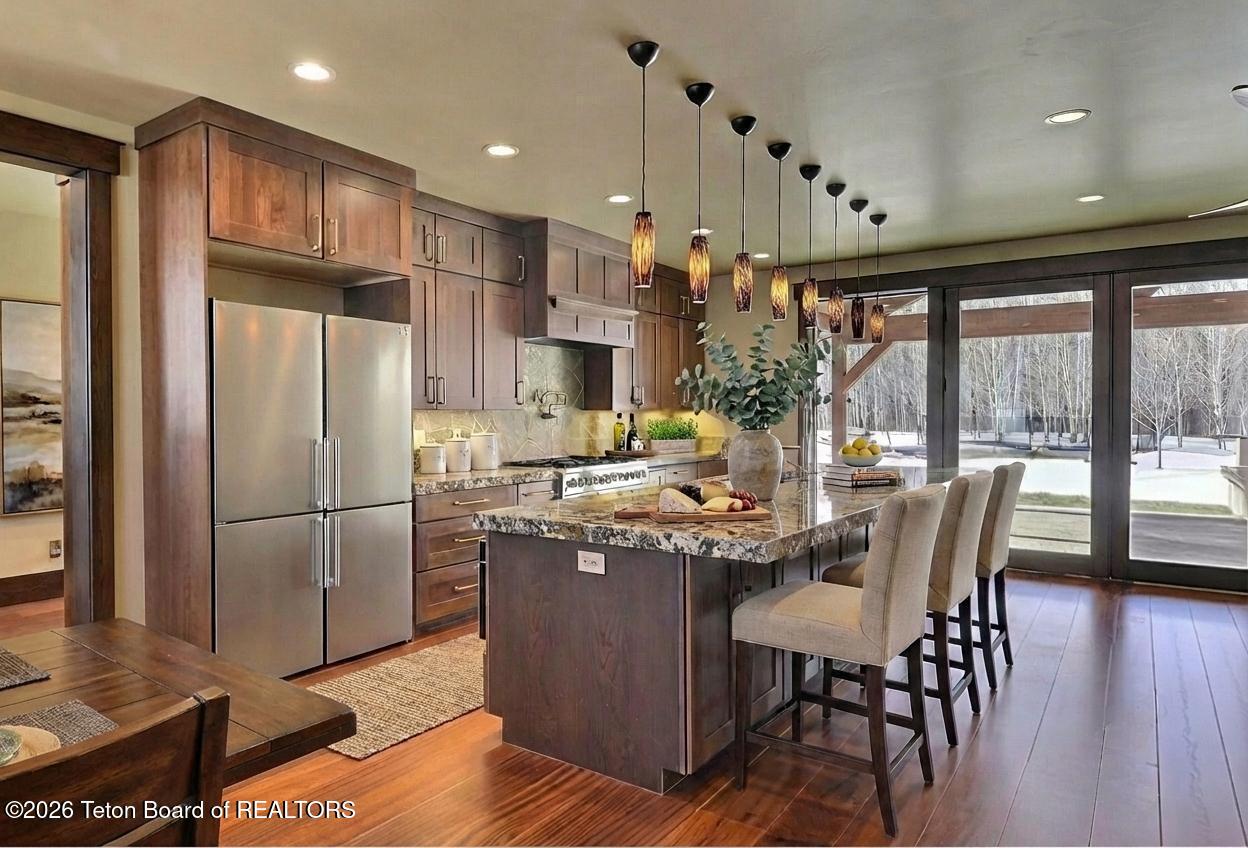 9802 Hiddenwaters Lane Victor, ID 83455 - Photo 7 of 52 Kitchen - Virtual Staging
