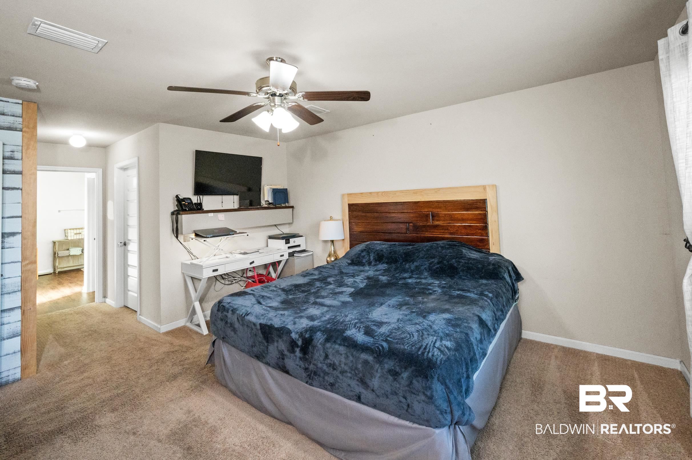 17449 Harding Drive Foley, AL 36535 - Photo 25 of 52 Carpeted bedroom featuring ceiling fan