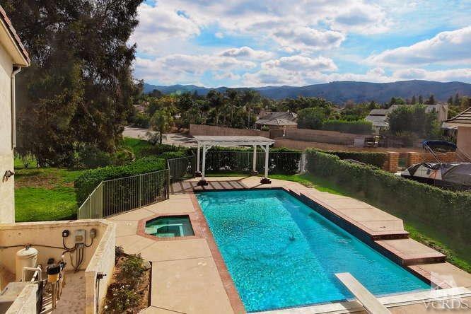 57 Highland Road Simi Valley, CA 93065 - Photo 2 of 46 a view of a swimming pool with a patio