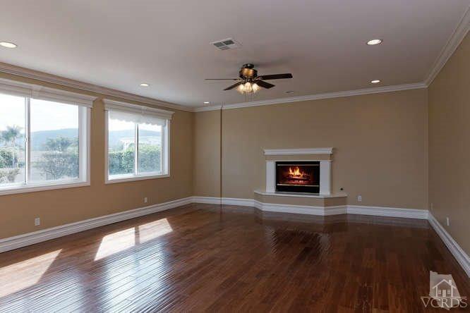 57 Highland Road Simi Valley, CA 93065 - Photo 11 of 46 a view of an empty room with a window and wooden floor