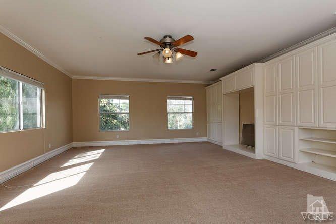 57 Highland Road Simi Valley, CA 93065 - Photo 14 of 46 a view of a livingroom with a window and a ceiling fan