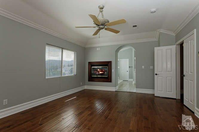 57 Highland Road Simi Valley, CA 93065 - Photo 15 of 46 a view of an empty room with wooden floor and a window