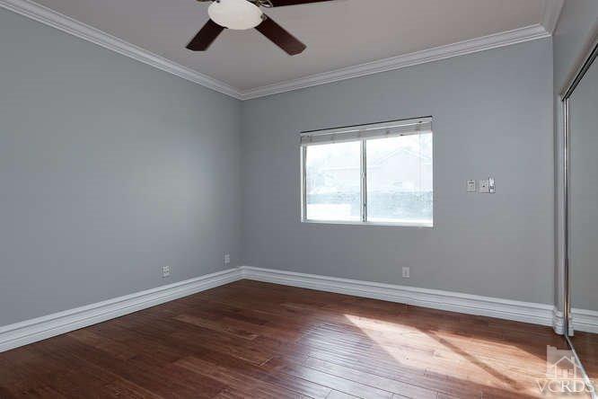 57 Highland Road Simi Valley, CA 93065 - Photo 21 of 46 wooden floor in an empty room with a window
