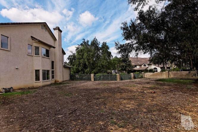 57 Highland Road Simi Valley, CA 93065 - Photo 29 of 46 a backyard of a house with large trees
