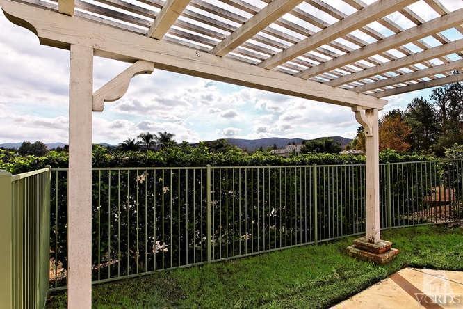 57 Highland Road Simi Valley, CA 93065 - Photo 34 of 46 a view of a deck with a big yard and a large tree