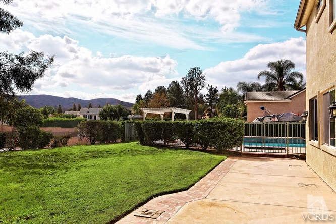 57 Highland Road Simi Valley, CA 93065 - Photo 37 of 46 a view of a patio with a table and chairs