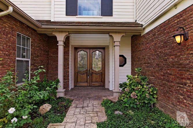 57 Highland Road Simi Valley, CA 93065 - Photo 5 of 46 a front view of a house with garden