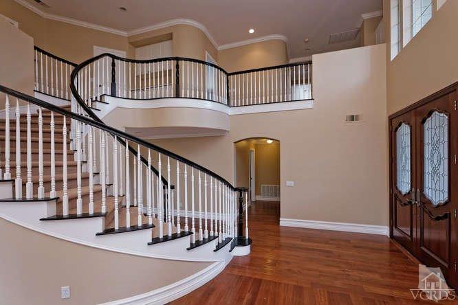 57 Highland Road Simi Valley, CA 93065 - Photo 7 of 46 a view of entryway with wooden floor and a front door