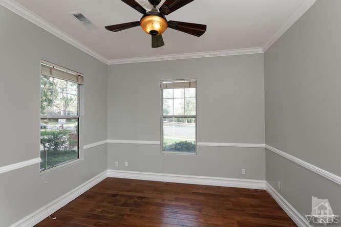 57 Highland Road Simi Valley, CA 93065 - Photo 10 of 46 a view of an empty room with wooden floor and a window
