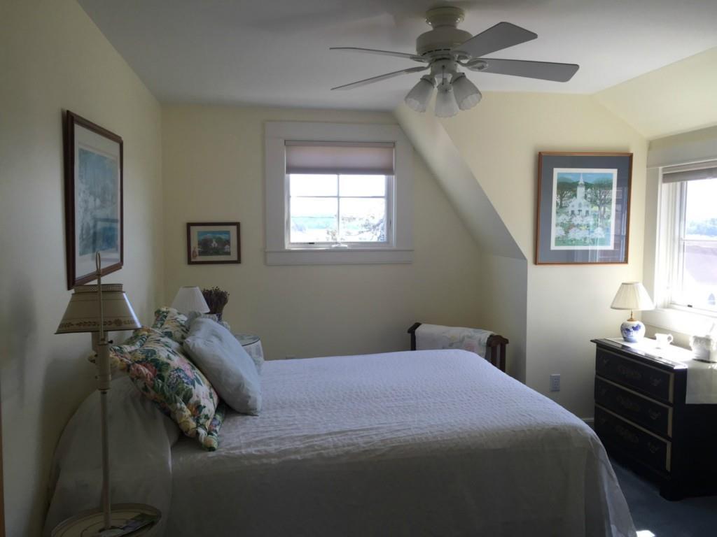 144 Perkins Street Castine, ME 04421 - Photo 18 of 21 Sun- filled bedroom with views of...