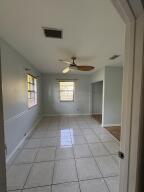 13529 42nd Road North West Palm Beach, FL 33411 - Photo 9 of 11 a view of an empty room and window