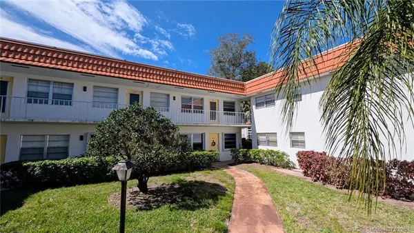 a house view with a garden space