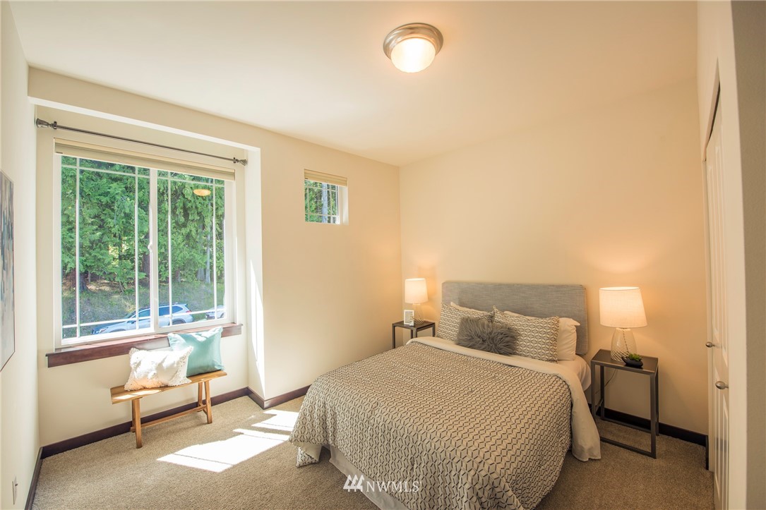 17409 3rd Avenue Southeast Bothell, WA 98012 - Photo 16 of 26 a bedroom with a bed and a window
