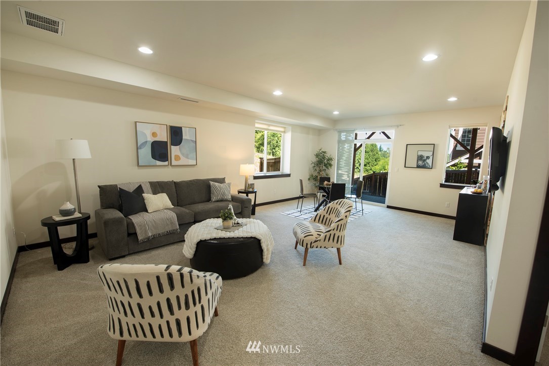 17409 3rd Avenue Southeast Bothell, WA 98012 - Photo 19 of 26 a living room with furniture and a couch