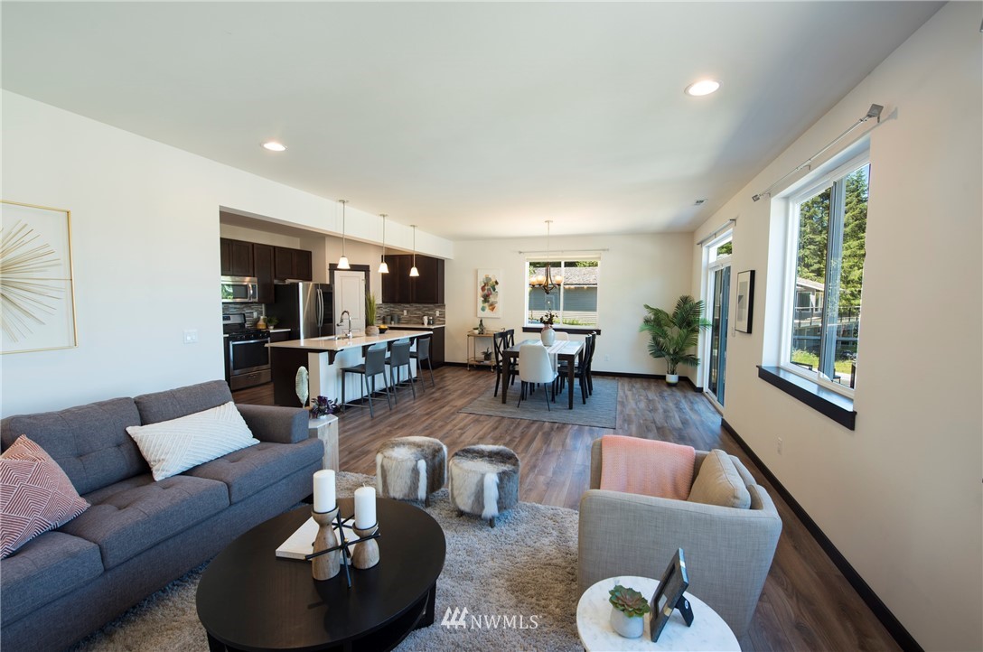 17409 3rd Avenue Southeast Bothell, WA 98012 - Photo 3 of 26 a living room with furniture kitchen view and a window