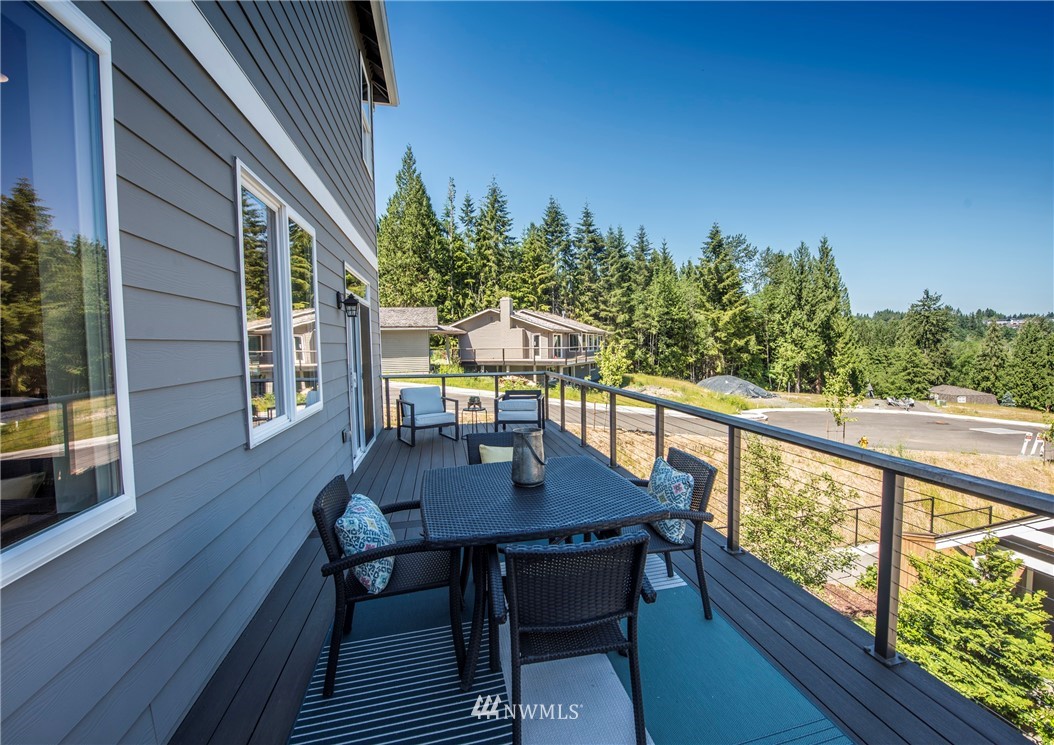 17409 3rd Avenue Southeast Bothell, WA 98012 - Photo 22 of 26 a view of balcony with furniture and wooden deck