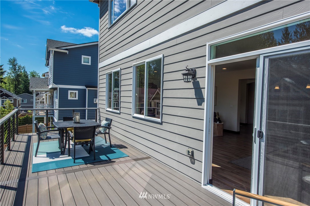 17409 3rd Avenue Southeast Bothell, WA 98012 - Photo 23 of 26 a view of a brick building with a bench in patio