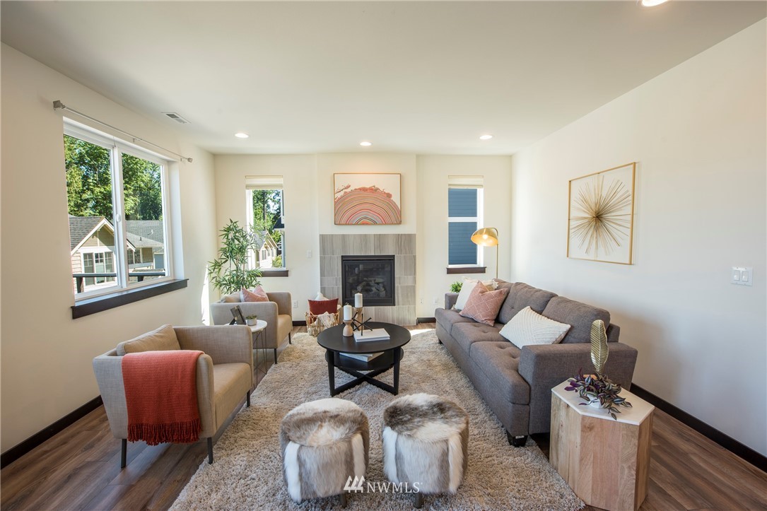 17409 3rd Avenue Southeast Bothell, WA 98012 - Photo 5 of 26 a living room with furniture and a fireplace