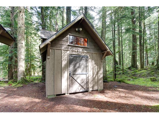 79546 Road 35 A, Unit 54 Rhododendron, OR 97049 - Photo 16 of 16 a view of a small house with a tree in the background
