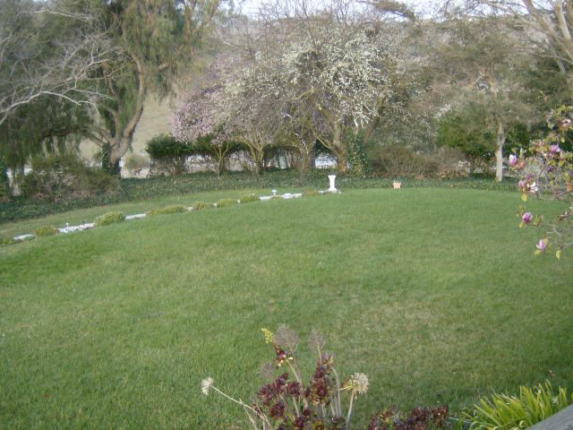 4061 Cienega Road Hollister, CA 95023 - Photo 15 of 25 a yellow building with trees in the background