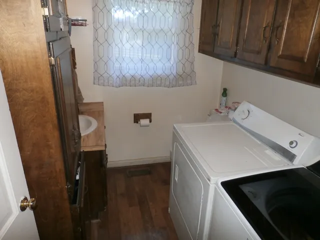a utility room with dryer and washer